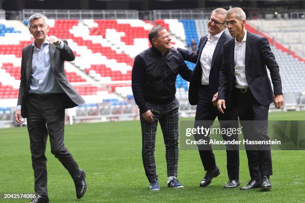 Max Eberl , Board Member for Sport FC Bayern München smiles with Herbert Hainer , President of FC Bayern München, Jan-Christian Dreesen, CEO of FC...