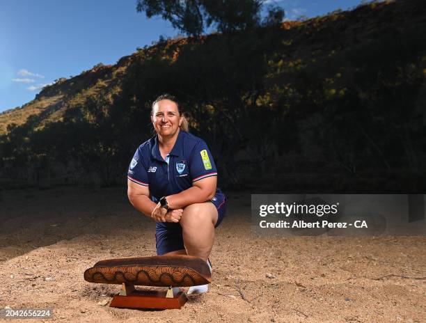 New South Wales women's team captain Julie Muir poses for portraits with the trophy after her team's victory over Queensland in the final of the 2024...