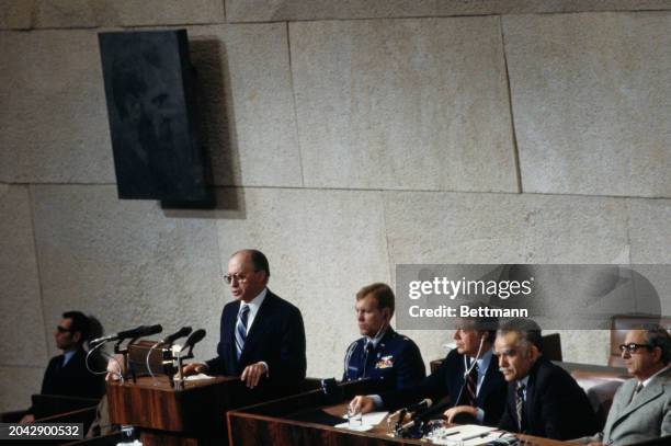 President Jimmy Carter listens as Israeli Prime Minister Menachem Begin addresses the Knesset in Jerusalem, March 12th 1979. Israeli President...