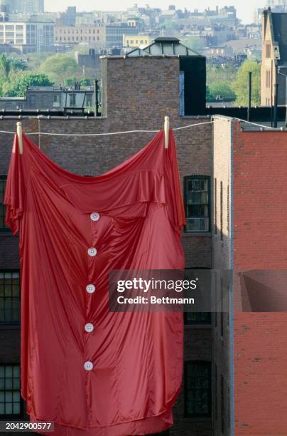 The 'Big Red Shirt' art installation by Robert Guest, a sculpture student at Pratt Institute in New York, June 28th 1979. The oversized garment,...