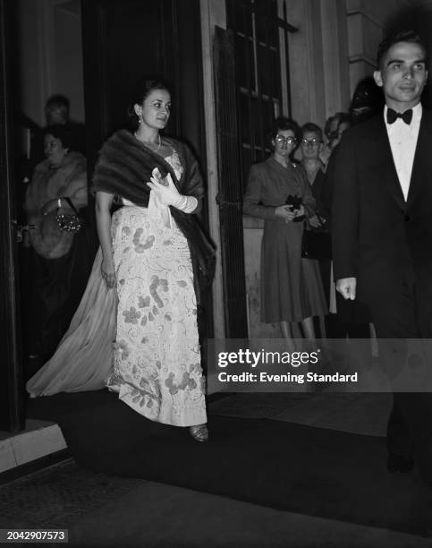 Dina bint Abdul-Hamid , Queen of Jordan, attending an event, June 24th 1955.