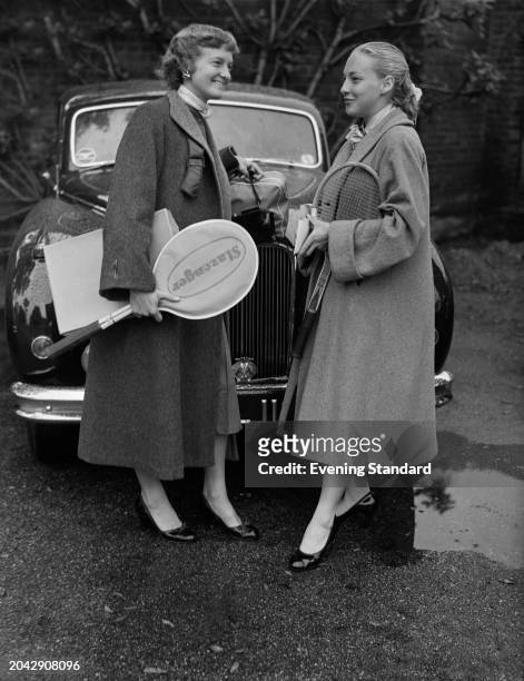 Australian tennis player Beryl Penrose and Darlene Hard , of the USA, in London to compete in the Wimbledon Tennis Championships, June 22nd 1955.
