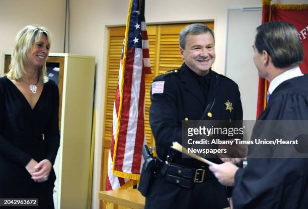 Sheriff Jack Mahar is sworn in for a third term by Hon. Michael Melkonian on Monday, Jan. 2, 2012 at the Rensselaer County Jail in Troy, N.Y. His...