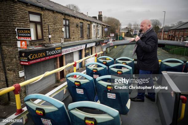 Simon Danczuk, the Reform UK candidate in the Rochdale by-election, campaigns for votes on an open top bus on February 27, 2024 in Rochdale, England....
