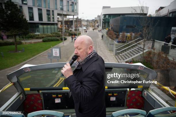 Simon Danczuk, the Reform UK candidate in the Rochdale by-election, campaigns for votes on an open top bus on February 27, 2024 in Rochdale, England....