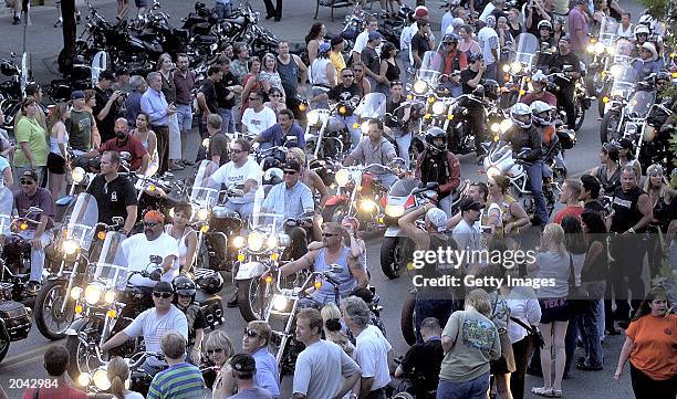 Crowds of spectators gather as thousands of bikers parade down Congress Avenue May 30, 2003 in Austin, Texas. The three-day event runs through June 1.