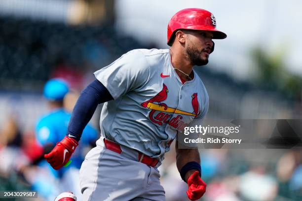 Ivan Herrera of the St. Louis Cardinals runs to first base during a spring training game against the Miami Marlins at Roger Dean Stadium on February...