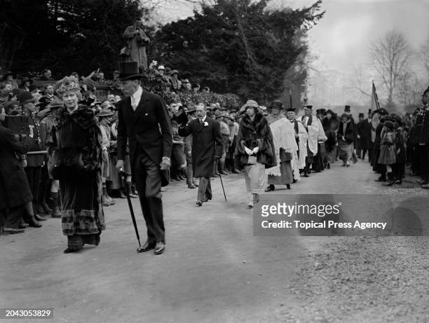 Mary of Teck, Queen consort walking with Henry Lascelles, 6th Earl of Harewood , followed by King George V and Mary, Princess Royal and Countess of...