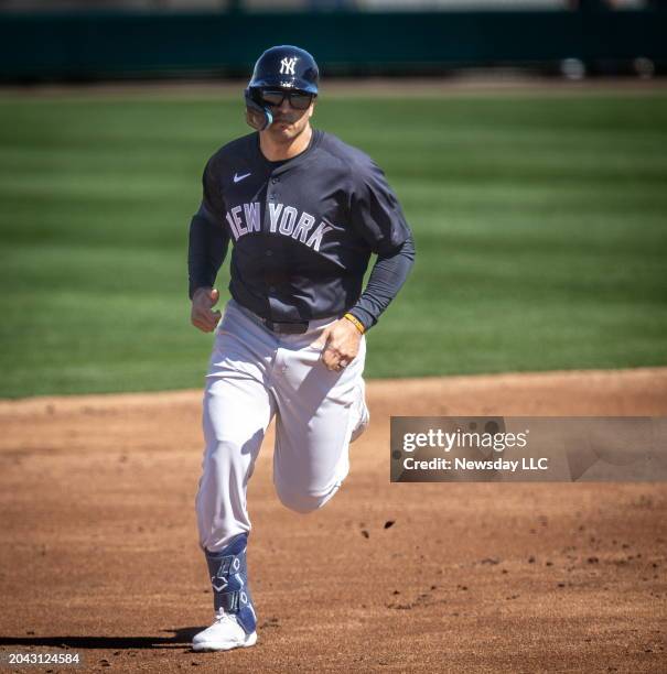 New York Yankees' Trent Grisham rounds the bases after hitting a three-run-homer in the 2nd inning against the Detroit Tigers at Joker Marchant...