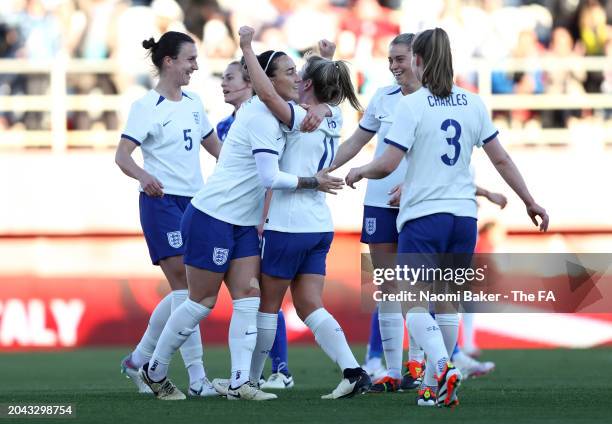 Lauren Hemp of England celebrates scoring her team's second goal with teammates during the Women's international friendly match between England and...