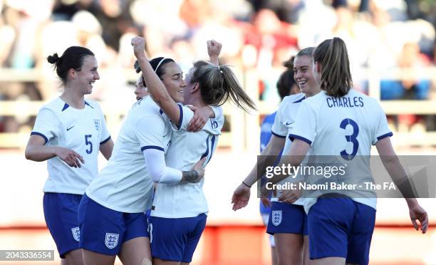 Lauren Hemp of England celebrates scoring her team's second goal with teammates during the Women's international friendly match between England and...