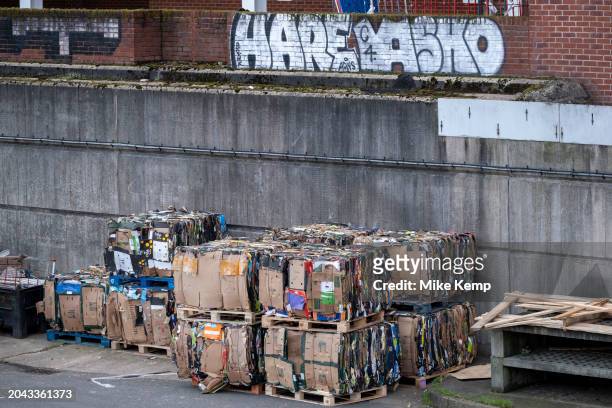Commercial waste collection cardboard rubbish recycling bailed neatly onto pallets ready for collection on 26th February 2024 in Birmingham, United...