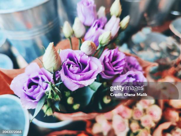 close-up of roses bouquets on the flower market - flower stall stock pictures, royalty-free photos & images
