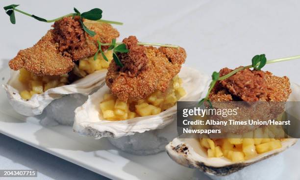 An appetizer of Oysters at Daisy Baker's on Tuesday, Oct. 9, 2012 in Troy, N.Y. Menu description - yellow cornmeal fried bluepoint's with a grilled...
