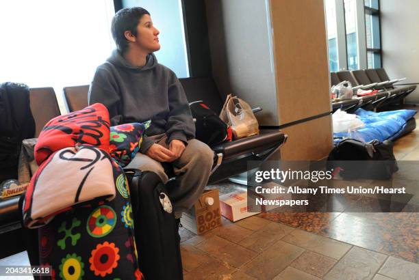 Stranded passenger Madeline Gonzalez from Chicago and is traveling to Framingham, MA. Waits at the Albany-Rensselaer Train Station on Tuesday, Oct....