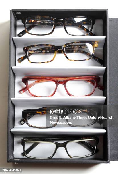 Warby Parker eye glasses on Tuesday, March 19, 2013 in Colonie, N.Y. From top to bottom, Fitz, Linwood, Marshall, Thompson and Reynold.