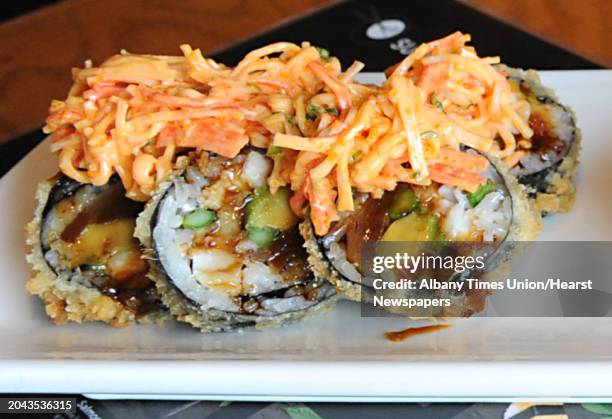 Paradise roll at Sushi Na Ra on Friday, May 10, 2013 in Clifton Park, N.Y. This roll is made with assorted raw fish, avacado, asparagus, cooked...
