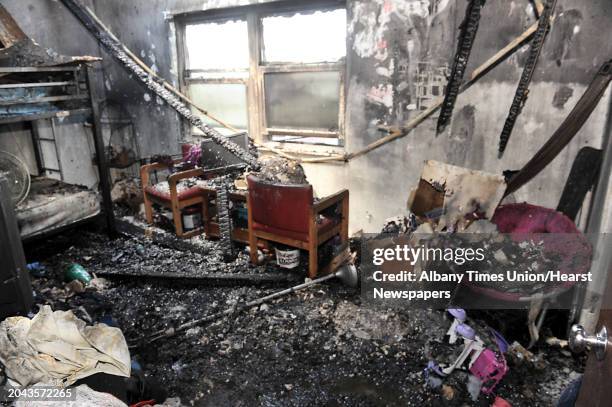 Fire damaged bedroom in the Martin Luther King Apartments on Friday, July 5, 2013 in Troy, N.Y. A fire which broke out overnight destroyed many...