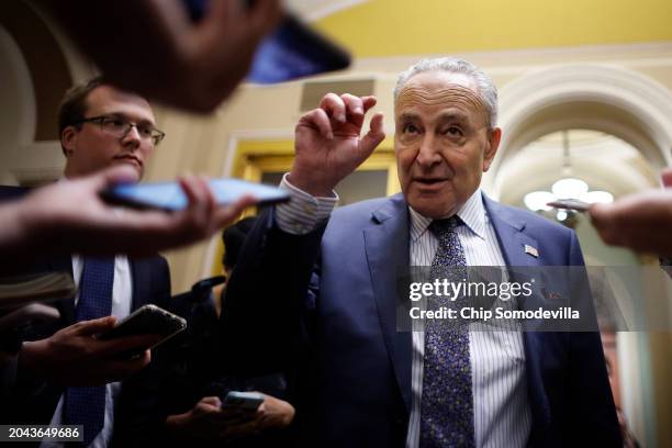 Senate Majority Leader Charles Schumer talks reporters as he returns to the U.S. Capitol following meetings at the White House on February 27, 2024...