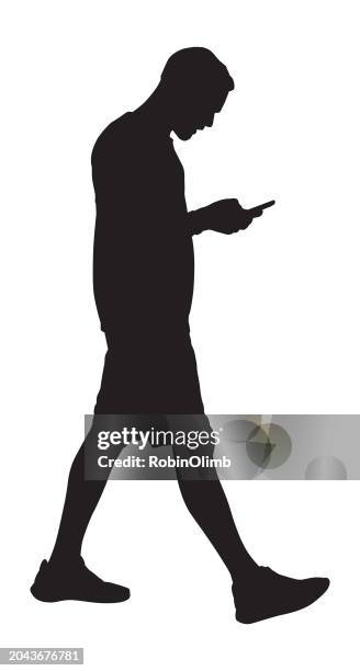 man walking with smart phone silhouette - shorts stock illustrations