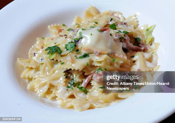 Farfalle con radicchio at Pasta Pane restaurant on Friday, Oct. 18, 2013 in Clifton Park, N.Y. This pasta dish is made with farfalle pasta,...