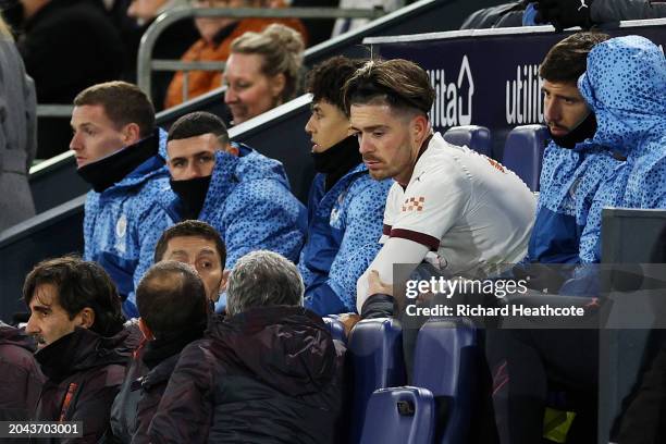 Jack Grealish of Manchester City looks dejected from the bench after leaving the field having sustained an injury during the Emirates FA Cup Fifth...