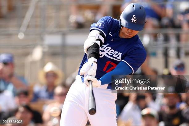 Shohei Ohtani of the Los Angeles Dodgers grounds into a double play in the third inning during a game against the Chicago White Sox at Camelback...
