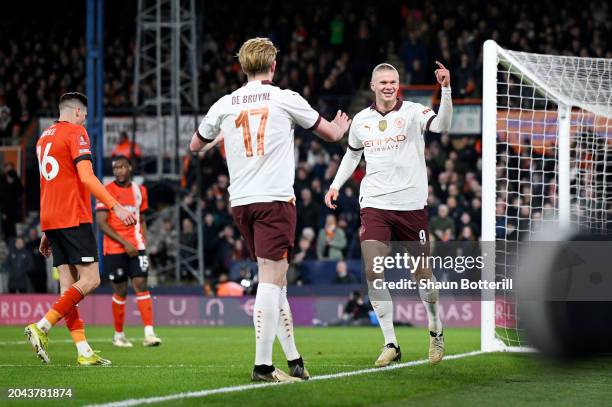 Erling Haaland of Manchester City celebrates scoring his team's fourth goal alongside teammate Kevin De Bruyne during the Emirates FA Cup Fifth Round...