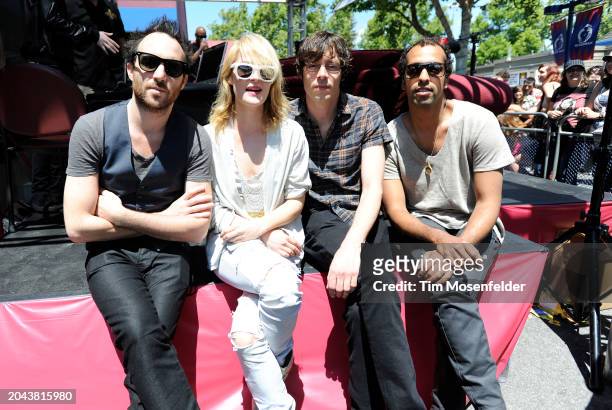 James Shaw, Emily Haines, Joshua Winstead, and Joules Scott-Key of Metric pose during Live 105's BFD at Shoreline Amphitheatre on June 6, 2009 in...