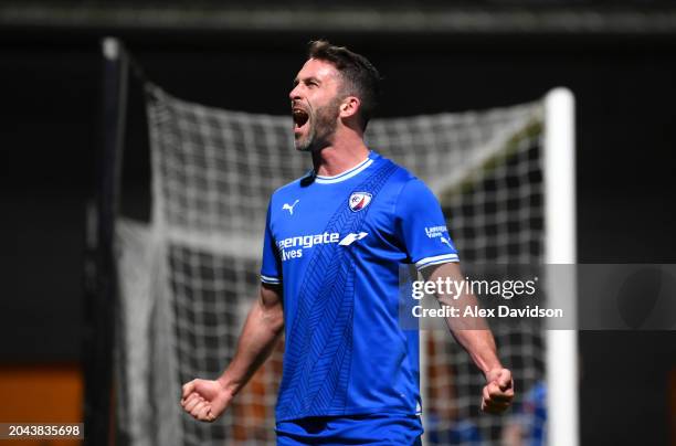 Will Grigg of Chesterfield celebrates scoring his teams 2nd goal during the Vanarama National League match between Barnet and Chesterfield at The...