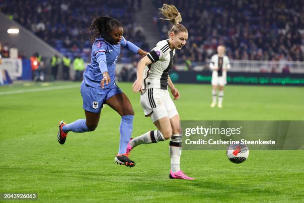 Kadidiatou Diani of France controls the ball against Sarai Linder of Germany during the UEFA Women's Nations League semi-final match between France...