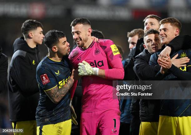 Bruno Guimaraes and Martin Dubravka of Newcastle United celebrate following the team's victory in the penalty shoot out in the Emirates FA Cup Fifth...