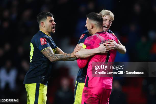 Martin Dubravka of Newcastle United is mobbed by teammates after saving the final penalty in the shootout during the Emirates FA Cup Fifth Round...