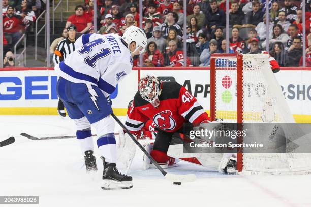 Tampa Bay Lightning right wing Mitchell Chaffee is stopped by New Jersey Devils goaltender Akira Schmid during a game between the against the against...