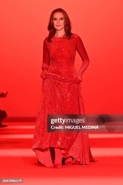 Actress Marcia Cross model presents a creation by Vetements for the Women Ready-to-wear Fall-Winter 2024/2025 collection as part of the Paris Fashion...