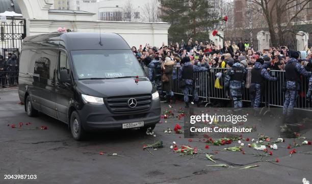 Hearse with Russian opposition leader Alexei Navalny leaves the Church of the Icon of the Mother of God, during his funeral, outside of an Orthodox...