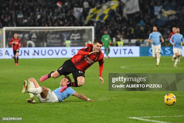 Milan's American forward Christian Pulisic fights for the ball with Lazio's Italian defender Luca Pellegrini during the Italian Serie A football...