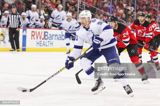 Tampa Bay Lightning center Steven Stamkos skates with the puck during a game between the against the against the Tampa Bay Lightning and New Jersey...