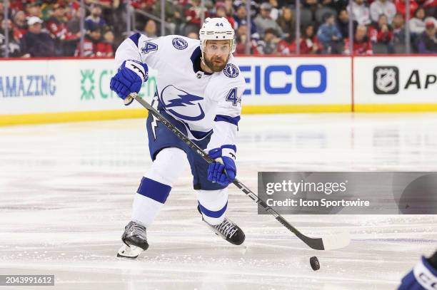 Tampa Bay Lightning defenseman Calvin de Haan skates with the puck during a game between the against the against the Tampa Bay Lightning and New...