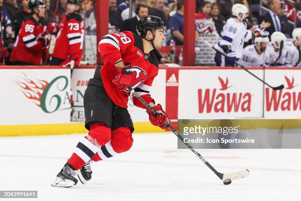 New Jersey Devils right wing Timo Meier skates with the puck during a game between the against the against the Tampa Bay Lightning and New Jersey...