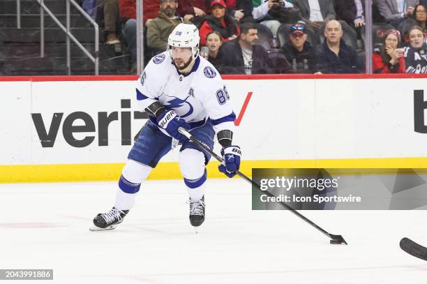 Tampa Bay Lightning right wing Nikita Kucherov skates with the puck during a game between the against the against the Tampa Bay Lightning and New...