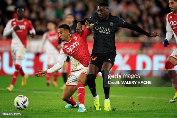 Monaco's German defender Thilo Kehrer fights for the ball with Paris Saint-Germain's French forward Randal Kolo Muani during the French L1 football...