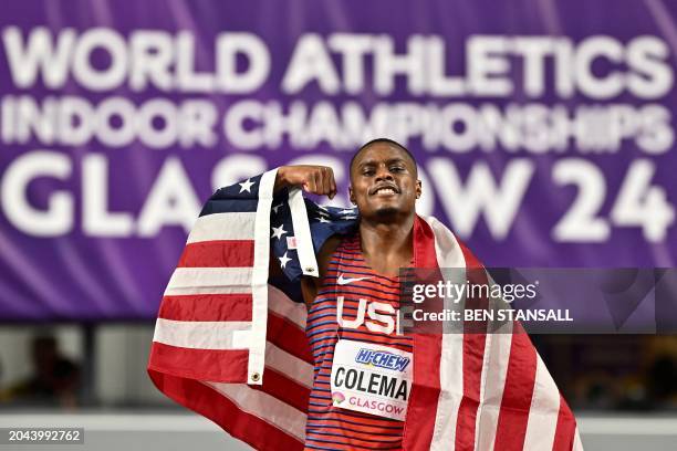 First-placed USA's Christian Coleman celebrates after winning in the Men's 60m final during the Indoor World Athletics Championships in Glasgow,...