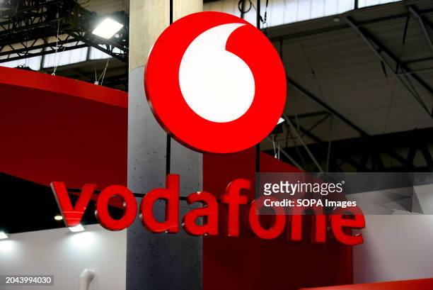 View of the logo of the UK company Vodafone at the Mobile World Congress 2024.