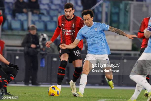 Felipe Anderson of Lazio and Theo Hernandez of Milan are in action during the Serie A soccer match between SS Lazio and AC Milan at Stadio Olimpico...