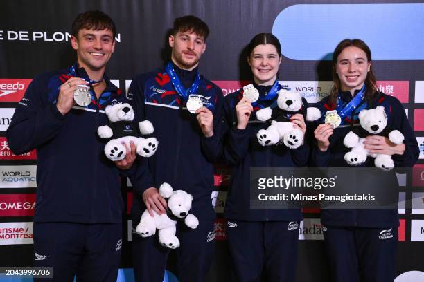 Anthony Harding, Thomas Daley, Andrea Spendolini Sirieix and Yasmin Harper of Great Britain pose with their silver medals after competing in the...