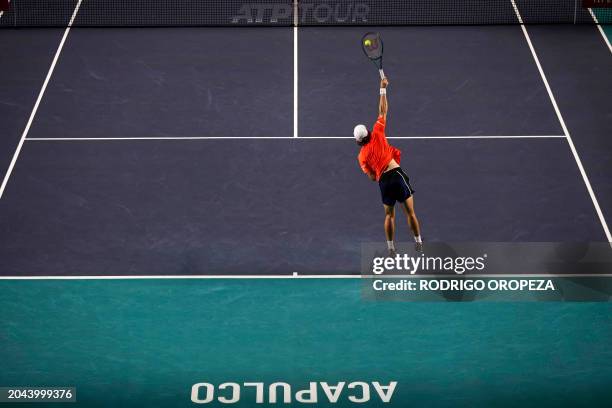 Australia's Alex De Minaur serves against Britain's Jack Draper during the Mexico ATP Open 500 men's singles semi-final tennis match at Arena GNP...