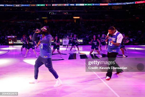 Yung and Mavv, of Cali Swags District, perform during half time of Los Angeles Clippers and Washington Wizards game at Crypto.com Arena on March 1,...