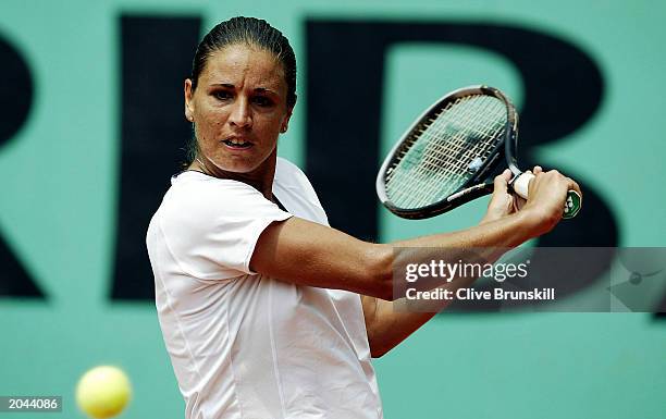 Rita Grande of Italy hits a backhand in her third round match against Magdalena Maleeva of Bulgaria during the sixth day of the French Open on May...