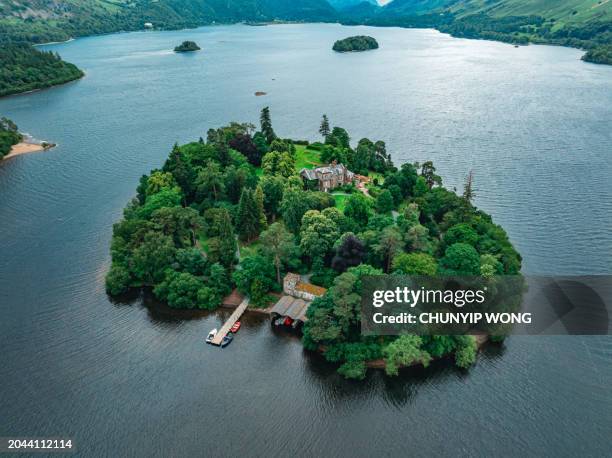 aerial view of a large, beautiful lake with islands at sunset (derwent water, lake district, england) - idyllic suburb stock pictures, royalty-free photos & images